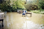 Wayside Cottage resident Brian Watson, in flooded Tea Gardens in 1975.