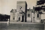 Cahore Castle with Evelyn & croquet lawn 1951.