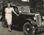Evelyn with her Austin at The Mead during the War; regularly raising funds for the war effort at The Tea Gardens with St. Catherine's parishioners and running 5 successful businesses - 600 would have tea at The Mead at a weekend. Huge endeavour and team work!